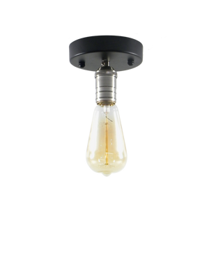 Flush mount light fixture with a black base and an exposed filament bulb.